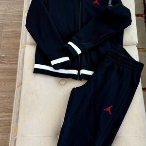 Jordan Black jogging set with Red Jump man Logo